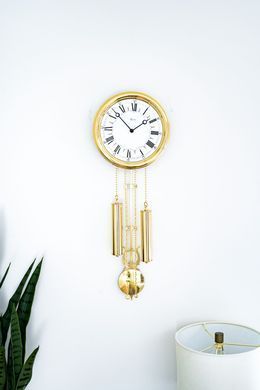 Stenska ura Majestic Brass Melody, Zlate